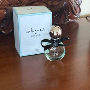 kate spade Walk on Air Eau de Parfum in light aqua with black bow 1fl oz